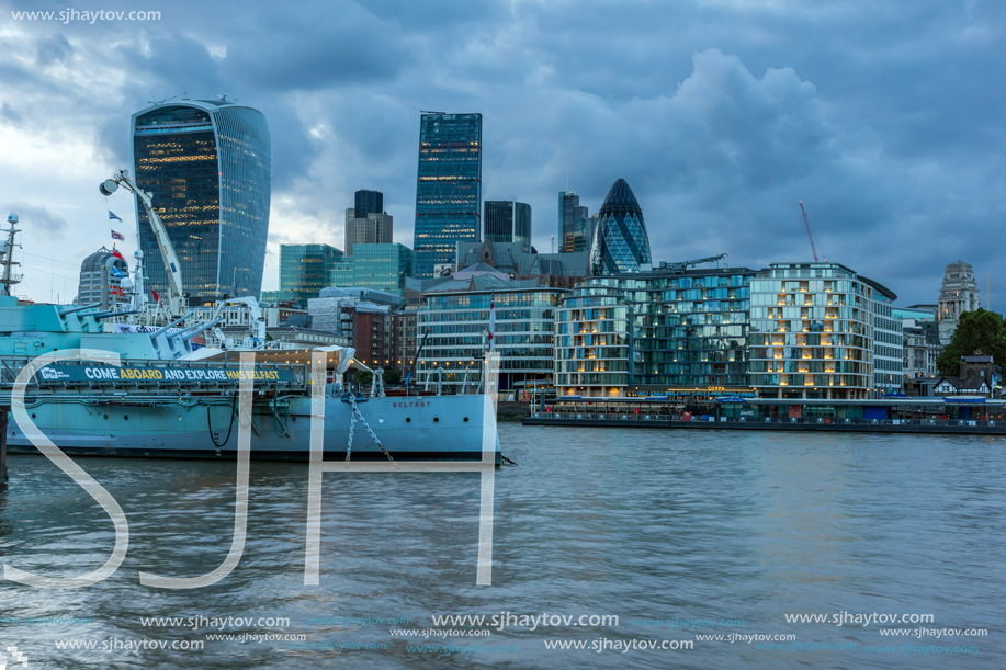 LONDON, ENGLAND - JUNE 15, 2016:  Sunset Skyline of London From Tower Bridge, England, United Kingdom