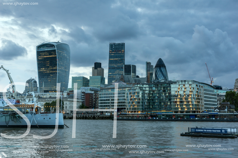 LONDON, ENGLAND - JUNE 15, 2016: Sunset Skyline of London From Tower Bridge, England, United Kingdom