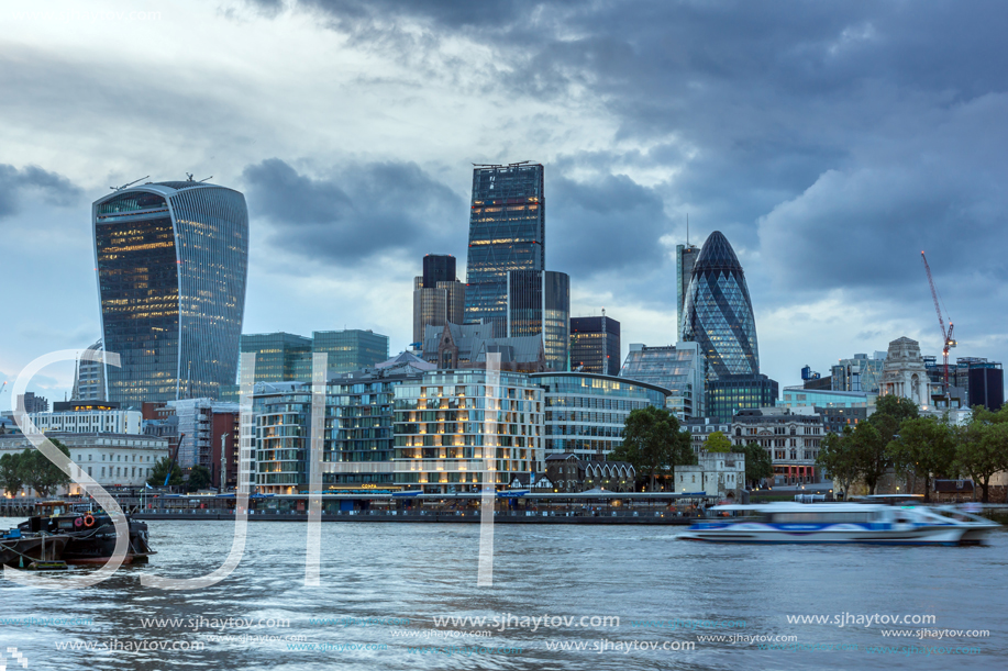 LONDON, ENGLAND - JUNE 15, 2016: Sunset Skyline of London From Tower Bridge, England, United Kingdom