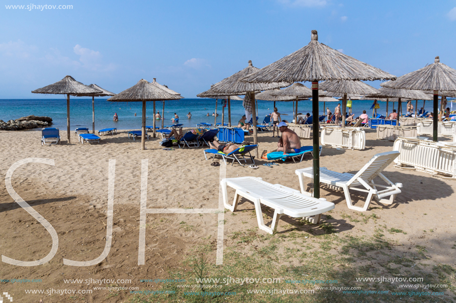 CHALKIDIKI, CENTRAL MACEDONIA, GREECE - AUGUST 25, 2014: Seascape of Blue Dolphin Cove Beach at Sithonia peninsula, Chalkidiki, Central Macedonia, Greece