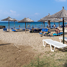 CHALKIDIKI, CENTRAL MACEDONIA, GREECE - AUGUST 25, 2014: Seascape of Blue Dolphin Cove Beach at Sithonia peninsula, Chalkidiki, Central Macedonia, Greece