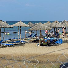 CHALKIDIKI, CENTRAL MACEDONIA, GREECE - AUGUST 25, 2014: Seascape of Blue Dolphin Cove Beach at Sithonia peninsula, Chalkidiki, Central Macedonia, Greece