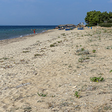 CHALKIDIKI, CENTRAL MACEDONIA, GREECE - AUGUST 25, 2014: Seascape of Blue Dolphin Cove Beach at Sithonia peninsula, Chalkidiki, Central Macedonia, Greece