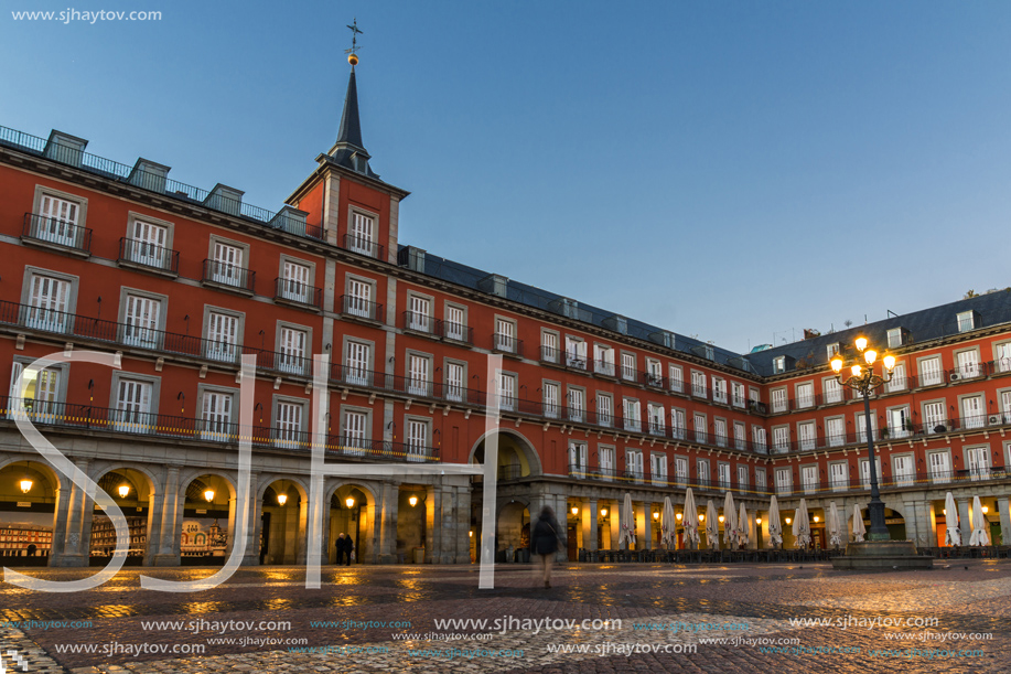 MADRID, SPAIN - JANUARY 22, 2018:  Sunrise view of Plaza Mayor with statue of King Philips III in Madrid, Spain