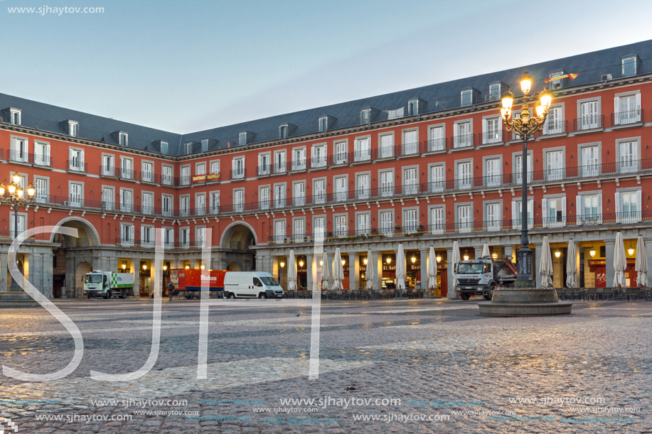 MADRID, SPAIN - JANUARY 22, 2018:  Sunrise view of Plaza Mayor with statue of King Philips III in Madrid, Spain