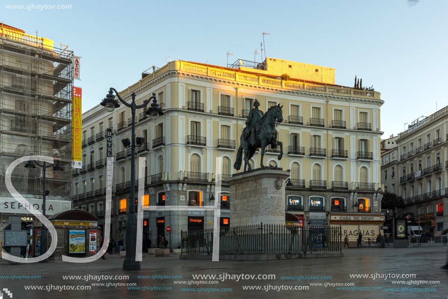 MADRID, SPAIN - JANUARY 22, 2018:  Sunrise view of Puerta del Sol in Madrid, Spain