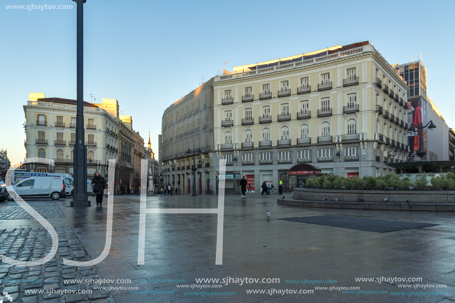 MADRID, SPAIN - JANUARY 22, 2018:  Sunrise view of Puerta del Sol in Madrid, Spain