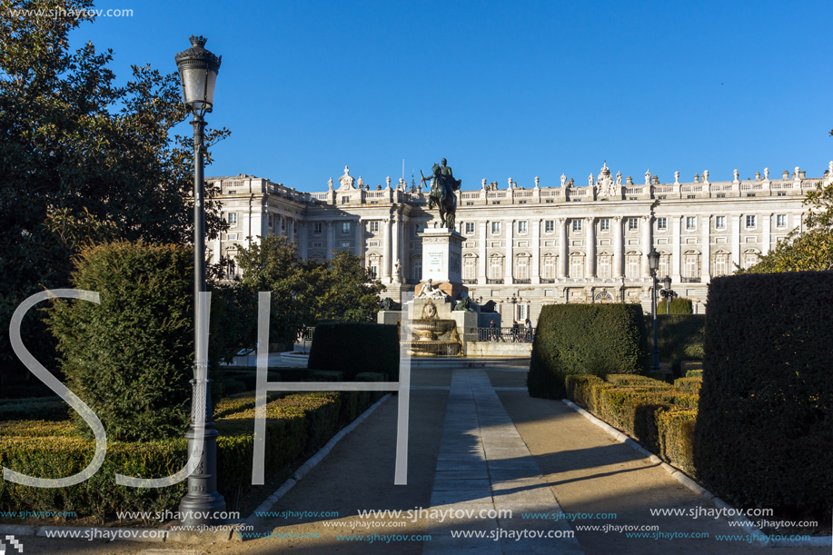 MADRID, SPAIN - JANUARY 22, 2018:  Beautiful view of Monument to Felipe IV and the Royal Palace of Madrid, Spain
