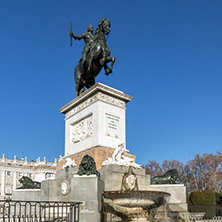 MADRID, SPAIN - JANUARY 22, 2018:  Beautiful view of Monument to Felipe IV and the Royal Palace of Madrid, Spain