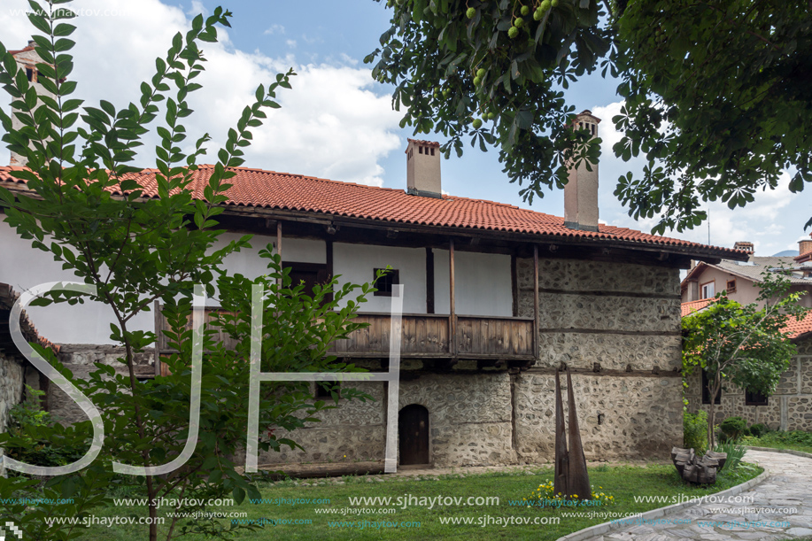 BANSKO, BULGARIA - AUGUST 13, 2013: Authentic nineteenth century houses in town of Bansko, Blagoevgrad Region, Bulgaria