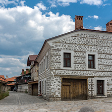 BANSKO, BULGARIA - AUGUST 13, 2013: Authentic nineteenth century houses in town of Bansko, Blagoevgrad Region, Bulgaria