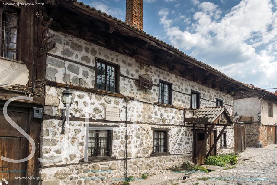 BANSKO, BULGARIA - AUGUST 13, 2013: Authentic nineteenth century houses in town of Bansko, Blagoevgrad Region, Bulgaria