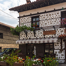 BANSKO, BULGARIA - AUGUST 13, 2013: Authentic nineteenth century houses in town of Bansko, Blagoevgrad Region, Bulgaria