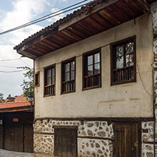 BANSKO, BULGARIA - AUGUST 13, 2013: Authentic nineteenth century houses in town of Bansko, Blagoevgrad Region, Bulgaria