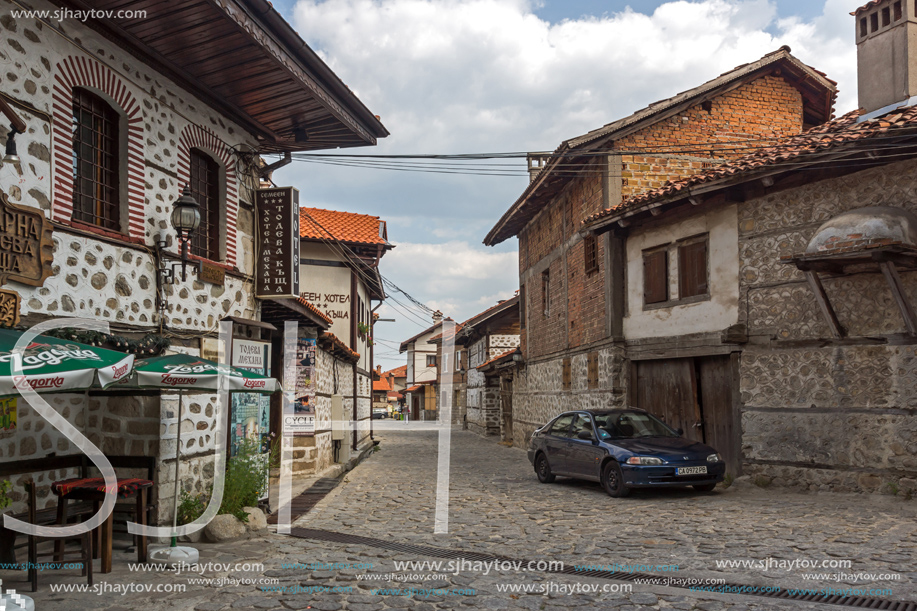 BANSKO, BULGARIA - AUGUST 13, 2013: Authentic nineteenth century houses in town of Bansko, Blagoevgrad Region, Bulgaria