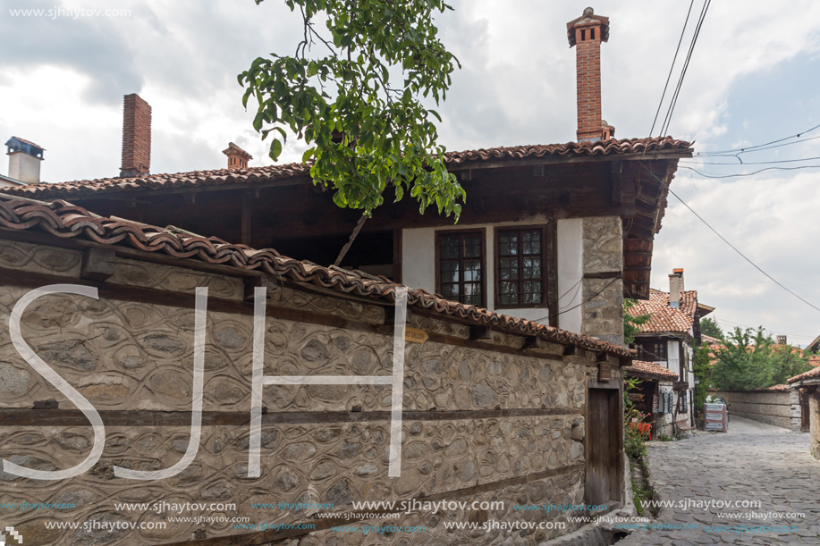 BANSKO, BULGARIA - AUGUST 13, 2013: Authentic nineteenth century houses in town of Bansko, Blagoevgrad Region, Bulgaria