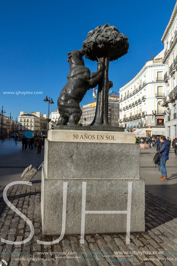 MADRID, SPAIN - JANUARY 22, 2018:  Statue of the Bear and the Strawberry Tree at Puerta del Sol in Madrid, Spain
