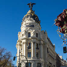 MADRID, SPAIN - JANUARY 22, 2018: Gran Via and Metropolis Building in City of Madrid, Spain