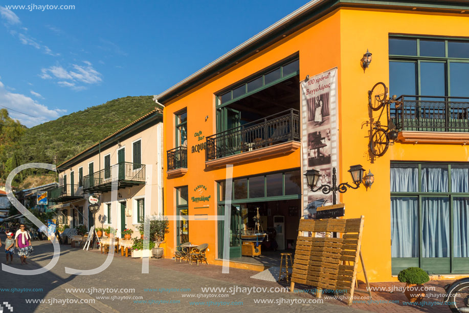 VASILIKI, LEFKADA, GREECE JULY 16, 2014: Coastal street with restaurants in Village of Vasiliki, Lefkada, Ionian Islands, Greece