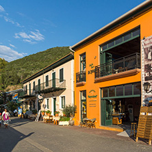 VASILIKI, LEFKADA, GREECE JULY 16, 2014: Coastal street with restaurants in Village of Vasiliki, Lefkada, Ionian Islands, Greece