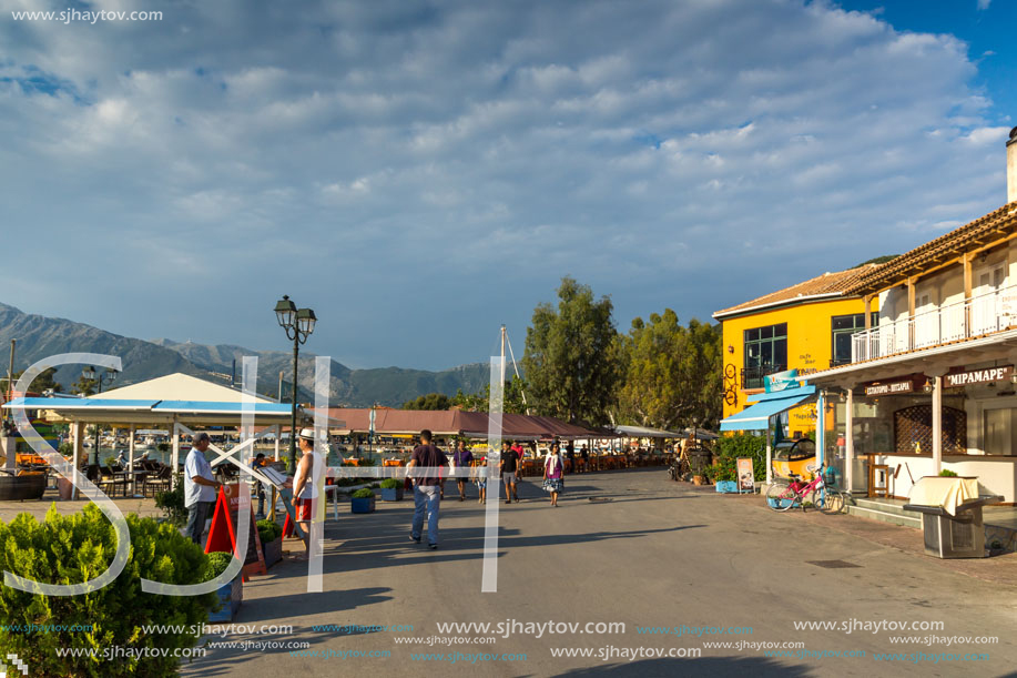 VASILIKI, LEFKADA, GREECE JULY 16, 2014: Coastal street with restaurants in Village of Vasiliki, Lefkada, Ionian Islands, Greece