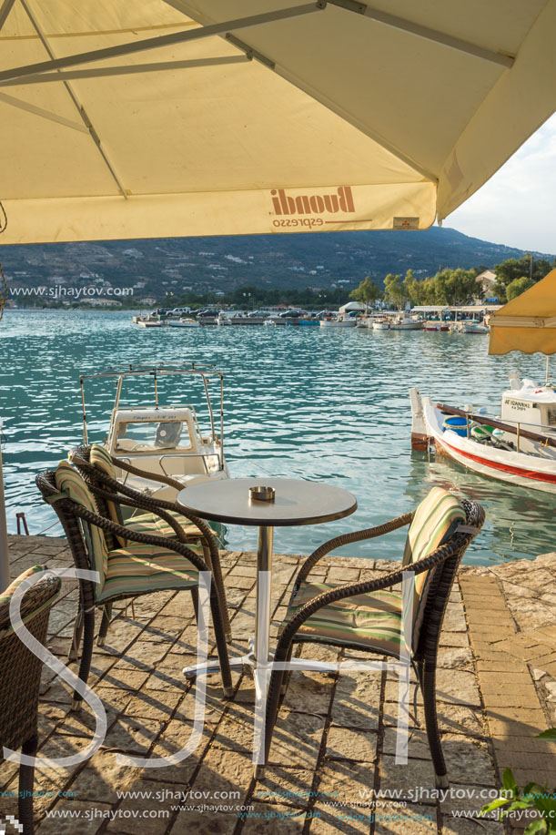 VASILIKI, LEFKADA, GREECE JULY 16, 2014: Coastal street with restaurants in Village of Vasiliki, Lefkada, Ionian Islands, Greece