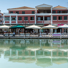 LEFKADA TOWN, GREECE JULY 17, 2014: Coastal street at Lefkada town, Ionian Islands, Greece