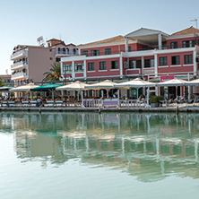 LEFKADA TOWN, GREECE JULY 17, 2014: Coastal street at Lefkada town, Ionian Islands, Greece