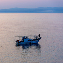 THASSOS, GREECE - APRIL 4, 2016: Sunset view on embankment of Thassos town, East Macedonia and Thrace, Greece