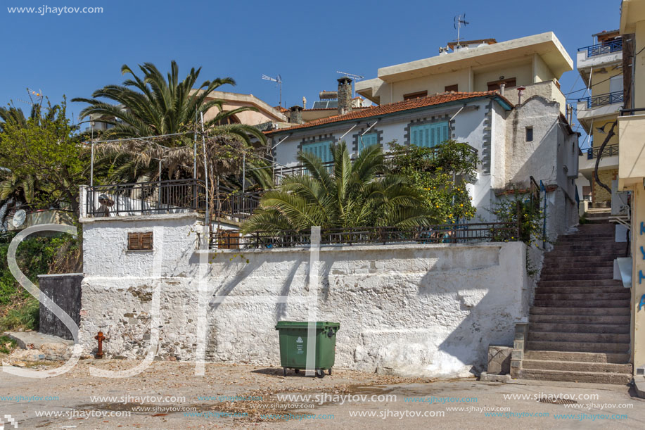 THASSOS, GREECE - APRIL 5, 2016:  Old houses at Embankment in Skala Maries, Thassos island, East Macedonia and Thrace, Greece