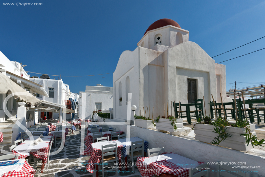 MYKONOS, GREECE - MAY 1, 2013: White orthodox church and small bell tower in Mykonos, Cyclades Islands, Greece