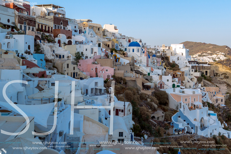 SANTORINI, GREECE - MAY 4, 2013: Amazing Sunset in town of Oia, Santorini island, Thira, Cyclades, Greece