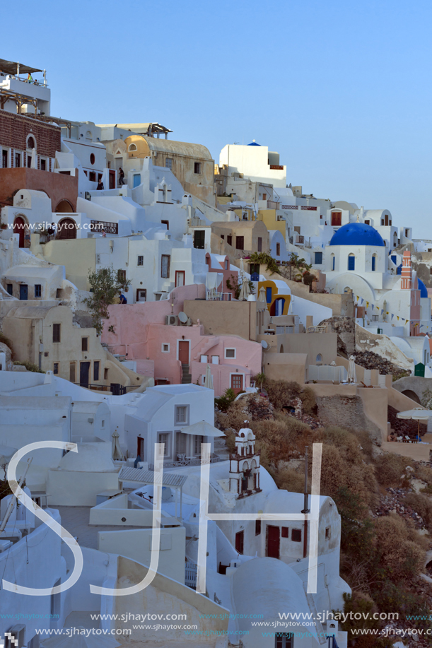 SANTORINI, GREECE - MAY 4, 2013: Amazing Sunset in town of Oia, Santorini island, Thira, Cyclades, Greece