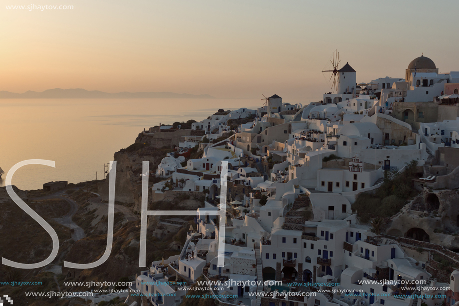 SANTORINI, GREECE - MAY 4, 2013: Amazing Sunset in town of Oia, Santorini island, Thira, Cyclades, Greece