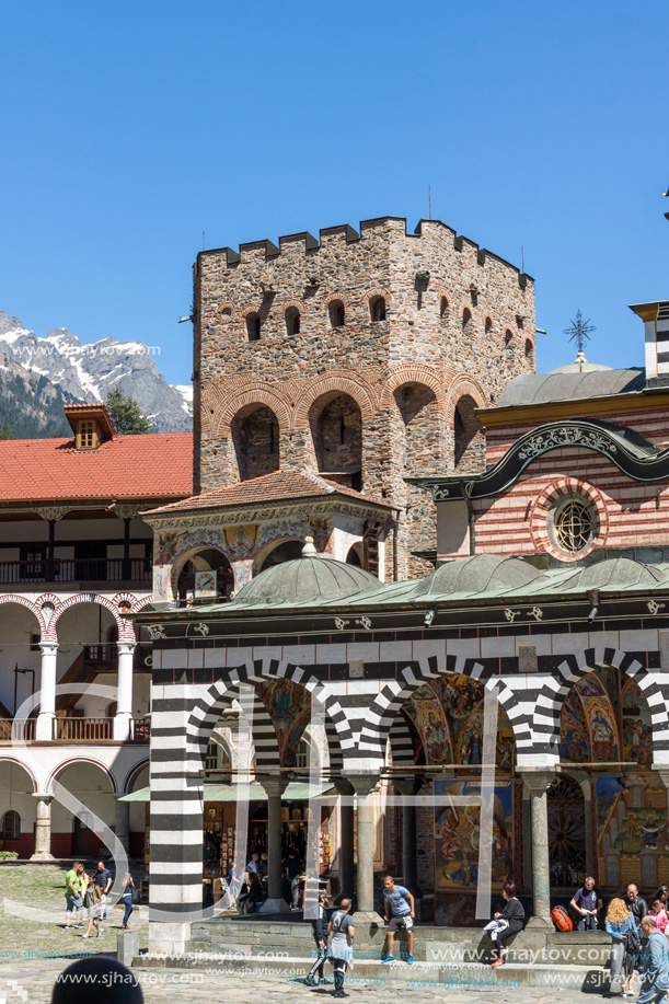 RILA MONASTERY, BULGARIA - APRIL 21, 2018: Tourist visiting Monastery of Saint Ivan (John) of Rila (Rila Monastery), Kyustendil Region, Bulgaria