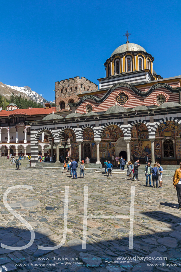 RILA MONASTERY, BULGARIA - APRIL 21, 2018: Tourist visiting Monastery of Saint Ivan (John) of Rila (Rila Monastery), Kyustendil Region, Bulgaria