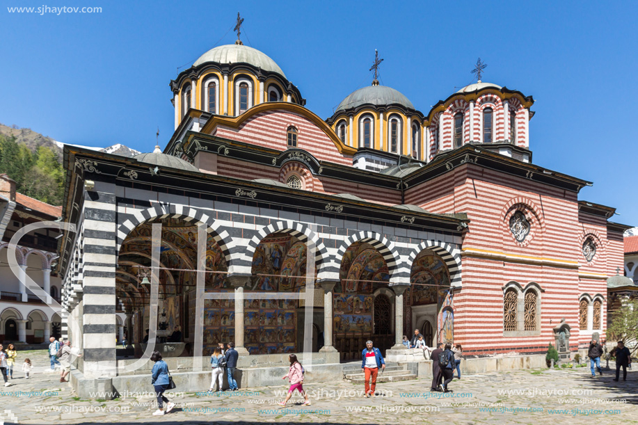RILA MONASTERY, BULGARIA - APRIL 21, 2018: Tourist visiting Monastery of Saint Ivan (John) of Rila (Rila Monastery), Kyustendil Region, Bulgaria