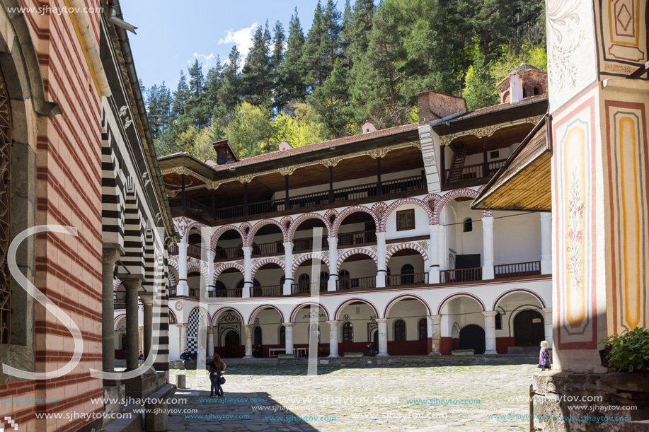 RILA MONASTERY, BULGARIA - APRIL 21, 2018: Tourist visiting Monastery of Saint Ivan (John) of Rila (Rila Monastery), Kyustendil Region, Bulgaria