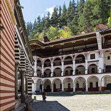 RILA MONASTERY, BULGARIA - APRIL 21, 2018: Tourist visiting Monastery of Saint Ivan (John) of Rila (Rila Monastery), Kyustendil Region, Bulgaria