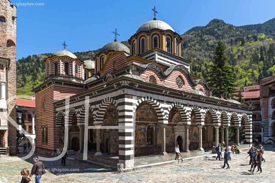 RILA MONASTERY, BULGARIA - APRIL 21, 2018: Tourist visiting Monastery of Saint Ivan (John) of Rila (Rila Monastery), Kyustendil Region, Bulgaria