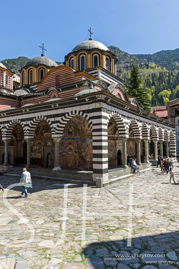 RILA MONASTERY, BULGARIA - APRIL 21, 2018: Tourist visiting Monastery of Saint Ivan (John) of Rila (Rila Monastery), Kyustendil Region, Bulgaria