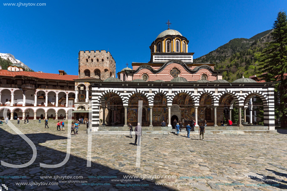 RILA MONASTERY, BULGARIA - APRIL 21, 2018: Tourist visiting Monastery of Saint Ivan (John) of Rila (Rila Monastery), Kyustendil Region, Bulgaria