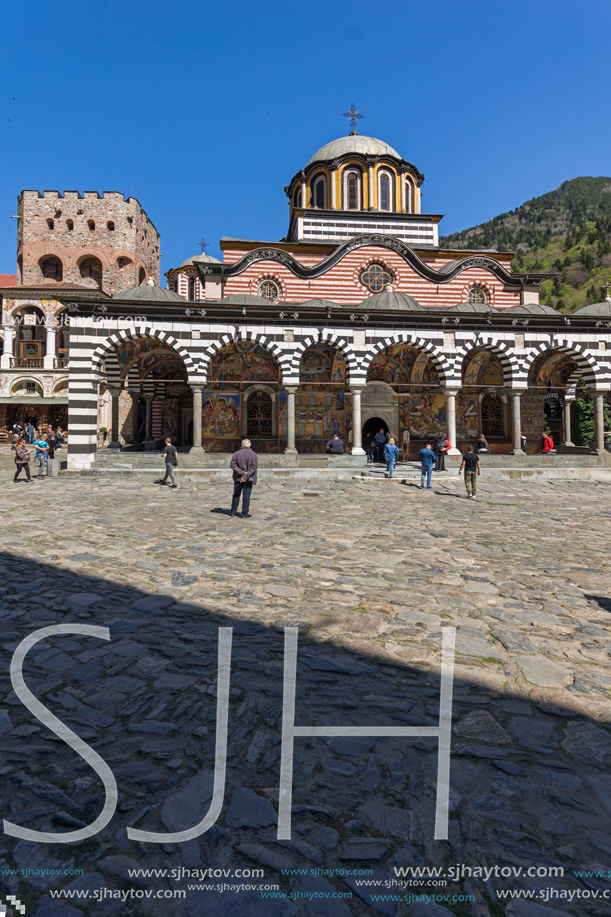 RILA MONASTERY, BULGARIA - APRIL 21, 2018: Tourist visiting Monastery of Saint Ivan (John) of Rila (Rila Monastery), Kyustendil Region, Bulgaria