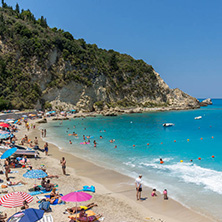 AGIOS NIKITAS, LEFKADA, GREECE - JULY 16, 2014: Tourist visiting beach of village of Agios Nikitas, Lefkada, Ionian Islands, Greece