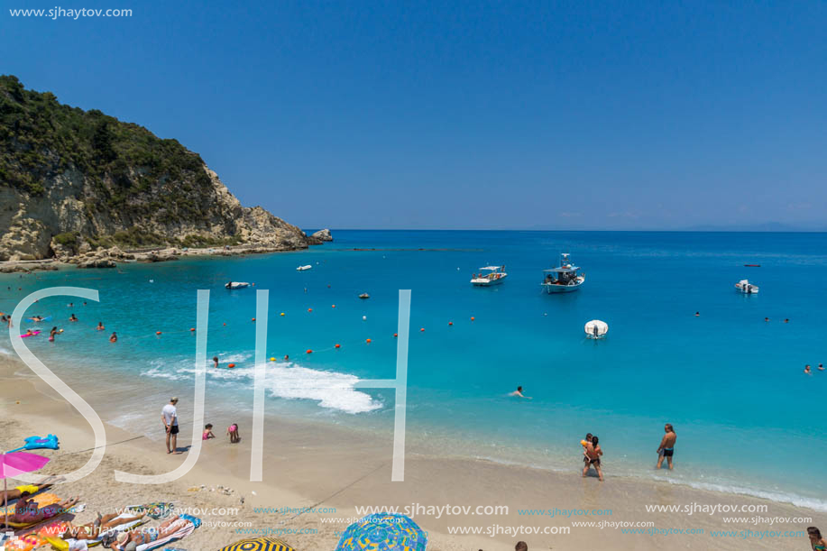 AGIOS NIKITAS, LEFKADA, GREECE - JULY 16, 2014: Tourist visiting beach of village of Agios Nikitas, Lefkada, Ionian Islands, Greece