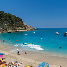 AGIOS NIKITAS, LEFKADA, GREECE - JULY 16, 2014: Tourist visiting beach of village of Agios Nikitas, Lefkada, Ionian Islands, Greece