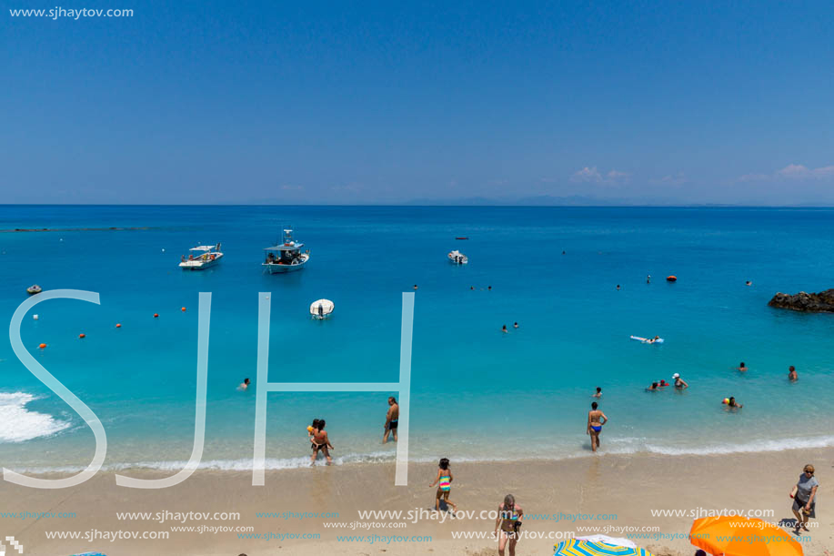 AGIOS NIKITAS, LEFKADA, GREECE - JULY 16, 2014: Tourist visiting beach of village of Agios Nikitas, Lefkada, Ionian Islands, Greece