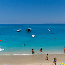 AGIOS NIKITAS, LEFKADA, GREECE - JULY 16, 2014: Tourist visiting beach of village of Agios Nikitas, Lefkada, Ionian Islands, Greece