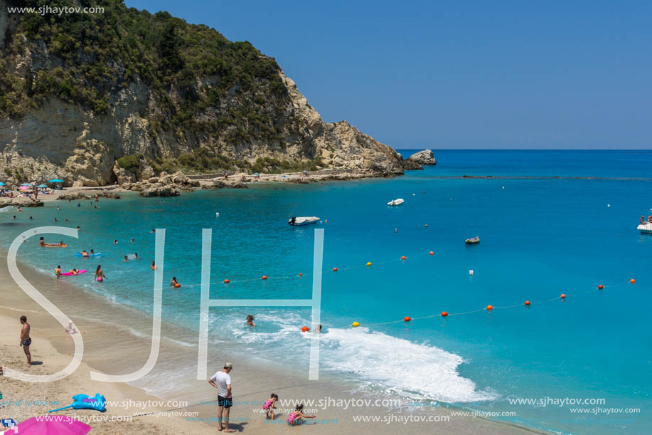 AGIOS NIKITAS, LEFKADA, GREECE - JULY 16, 2014: Tourist visiting beach of village of Agios Nikitas, Lefkada, Ionian Islands, Greece