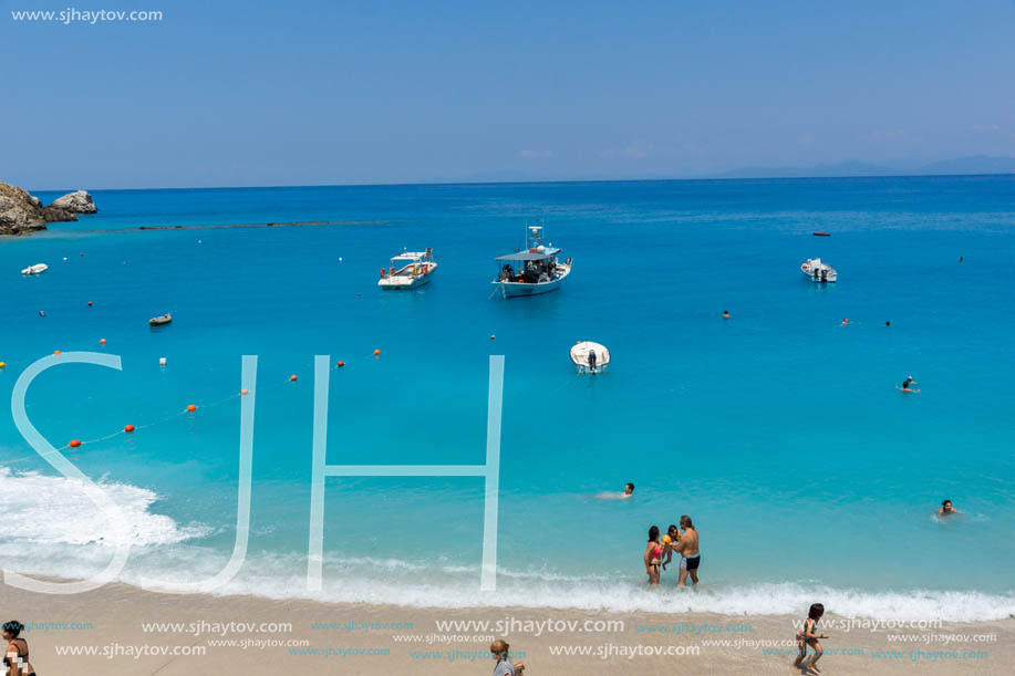 AGIOS NIKITAS, LEFKADA, GREECE - JULY 16, 2014: Tourist visiting beach of village of Agios Nikitas, Lefkada, Ionian Islands, Greece